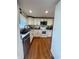 Spacious kitchen with granite countertops, stainless steel appliances, and ample cabinet space at 1041 Hervey St, Indianapolis, IN 46203