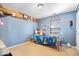 Cheerful bedroom with blue walls, playful decor, and a cozy bed at 10417 Mayapple Ct, Noblesville, IN 46060