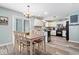 Spacious eat-in kitchen featuring stainless appliances and white cabinetry at 10417 Mayapple Ct, Noblesville, IN 46060