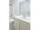This pristine bathroom provides a vanity for storage, updated lighting, and seamless cleaning at 105 Fountain Dr, Mooresville, IN 46158