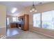 Open-concept kitchen featuring oak cabinetry, modern appliances, and lots of natural light at 105 Fountain Dr, Mooresville, IN 46158