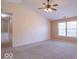 Bright living room with carpet, vaulted ceilings, neutral walls, and several large windows at 105 Fountain Dr, Mooresville, IN 46158