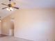 Open living space with neutral paint and a large ceiling fan with lighting fixture at 105 Fountain Dr, Mooresville, IN 46158