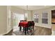 Cozy dining area with ample natural light, a table, and a rug at 10811 Wild Orchard Ln, Indianapolis, IN 46239