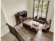 Spacious living room with high ceilings, an entertainment center, and comfortable leather seating, filled with natural light at 10811 Wild Orchard Ln, Indianapolis, IN 46239