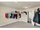 Large walk-in closet offers ample storage with shelving and hanging rods, perfect for organizing any wardrobe at 10811 Wild Orchard Ln, Indianapolis, IN 46239