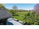 Spacious backyard with a large deck, perfect for outdoor entertaining and enjoying serene views at 10844 Bentwater Ln, Fishers, IN 46037