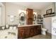 Bathroom with a double sink vanity, lots of storage and modern lighting at 10844 Bentwater Ln, Fishers, IN 46037