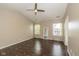 A light and airy bedroom with ample natural light and wood flooring at 10844 Bentwater Ln, Fishers, IN 46037