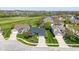 Well-maintained home with inviting curb appeal, mature trees, and lush landscaping on a golf course at 10844 Bentwater Ln, Fishers, IN 46037