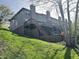 Multi-level wooden decks provide outdoor living space for this hillside home at 11223 Fonthill Dr, Indianapolis, IN 46236