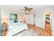 Spacious bedroom features hardwood floors, natural light, and a closet at 11359 Peacock Dr, Indianapolis, IN 46236