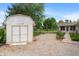 Spacious backyard featuring a shed, firepit, and charming swing set at 11415 Central E Dr, Carmel, IN 46032