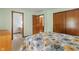 Bedroom featuring carpeted floors, closet, and neutral-colored walls at 11415 Central E Dr, Carmel, IN 46032
