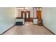 Cozy living room with dark wood accents, and black ottoman at 11415 Central E Dr, Carmel, IN 46032