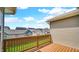 This home features a wood deck overlooking a beautiful green space and other houses in the community at 11436 Mossy Ct # 101, Fishers, IN 46037