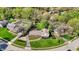 Aerial view showcases the home's prime location in a serene neighborhood with mature trees and well-kept lawns at 11626 Forest Dr, Carmel, IN 46033