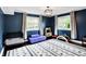 Comfortable bedroom with soft carpet, neutral color scheme, and lots of natural light at 11626 Forest Dr, Carmel, IN 46033