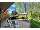 This outdoor space features a patio with seating and a grill, perfect for relaxing or entertaining at 11626 Forest Dr, Carmel, IN 46033