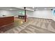 Spacious basement featuring a pool table, bar, and open area for entertaining at 11642 Old Stone Dr, Indianapolis, IN 46236