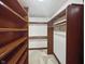 Walk-in closet offering shelving and hanging space for optimal storage and organization at 11642 Old Stone Dr, Indianapolis, IN 46236