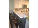 Updated kitchen featuring a breakfast bar with granite countertops, stainless appliances, and ample storage at 12214 Cold Stream Rd, Noblesville, IN 46060