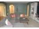 Spacious living room with an L-shaped couch, decorative pillows, and stylish decor at 12214 Cold Stream Rd, Noblesville, IN 46060