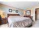 Comfortable bedroom featuring a queen size bed, and natural light at 123 Thistlewood Dr, Greenfield, IN 46140