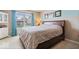 Bright bedroom with a large window with view and a big bed at 123 Thistlewood Dr, Greenfield, IN 46140