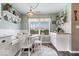 Bright breakfast nook featuring a cozy seating arrangement and charming decor at 123 Thistlewood Dr, Greenfield, IN 46140