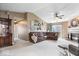 Spacious living room with vaulted ceilings, cozy seating, and a fireplace at 123 Thistlewood Dr, Greenfield, IN 46140