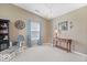 Cozy living room with neutral tones, chair and ottoman set and window at 123 Thistlewood Dr, Greenfield, IN 46140