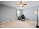 Bright room showcasing a workspace by the window with a black desk and chair, offering a well-lit area at 132 Thistlewood Dr, Greenfield, IN 46140