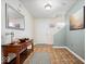 Entryway features a console table, neutral walls, and tiled flooring, providing a welcoming entrance at 132 Thistlewood Dr, Greenfield, IN 46140