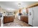 Bright and spacious kitchen with wood cabinets and ample counter space at 132 Thistlewood Dr, Greenfield, IN 46140