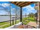 Relaxing balcony view showcasing waterfront scenery, lush greenery, and outdoor seating at 13797 E Southshore Dr, Fishers, IN 46037