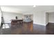 Open basement featuring recreation area with a pool table, snack bar, and dark wood flooring at 13797 E Southshore Dr, Fishers, IN 46037