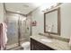 Bathroom with tile shower and granite countertop at 13797 E Southshore Dr, Fishers, IN 46037