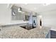Modern kitchen featuring stainless steel appliances, granite countertops, and stylish pendant lighting at 13797 E Southshore Dr, Fishers, IN 46037