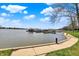 View of Geist Reservoir showing piers, and sidewalk at 13797 E Southshore Dr, Fishers, IN 46037