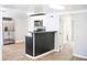 Bright kitchen with modern stainless steel appliances and a convenient breakfast bar at 1410 E 75Th St, Indianapolis, IN 46240