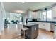 Modern kitchen featuring white cabinets, granite countertops, stainless steel appliances and open living concept at 14386 Salem E Dr, Carmel, IN 46033