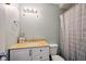 Traditional bathroom featuring a vanity, toilet, and a shower with a curtain at 14429 Banister Dr, Noblesville, IN 46060