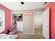 Pink bedroom with carpet, and view to doorway at 14429 Banister Dr, Noblesville, IN 46060