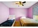 Cozy bedroom with two twin beds and a neutral color scheme at 14429 Banister Dr, Noblesville, IN 46060