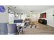 Bright living room featuring modern furniture, stylish decor, and wood-look flooring at 14429 Banister Dr, Noblesville, IN 46060
