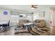 Open-concept living and dining area with stylish furnishings and wood-look flooring at 14429 Banister Dr, Noblesville, IN 46060