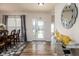 Elegant foyer featuring hardwood flooring, decorative accents, and a welcoming atmosphere, setting a sophisticated tone at 15142 Blue Ribbon Blvd, Fishers, IN 46040