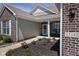 Attractive home exterior with brick and siding accents, complemented by a landscaped yard, enhancing its appeal at 15142 Blue Ribbon Blvd, Fishers, IN 46040