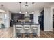 Modern kitchen featuring a center island, granite countertops, and stainless steel appliances, ideal for cooking at 15142 Blue Ribbon Blvd, Fishers, IN 46040